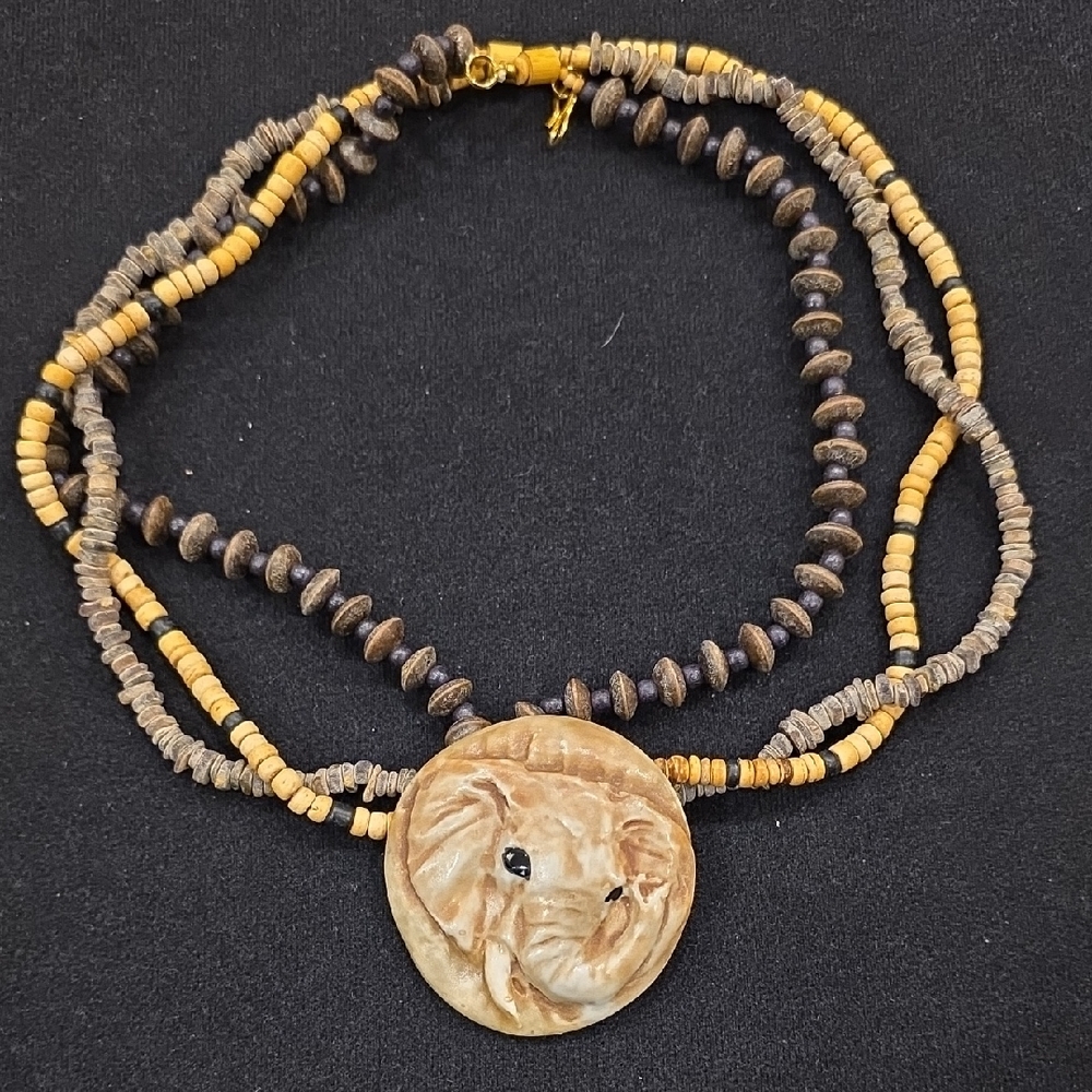 Designer Carol Hamny Handcrafted Elephant Pendant Necklace Bone, Wood, Stone.